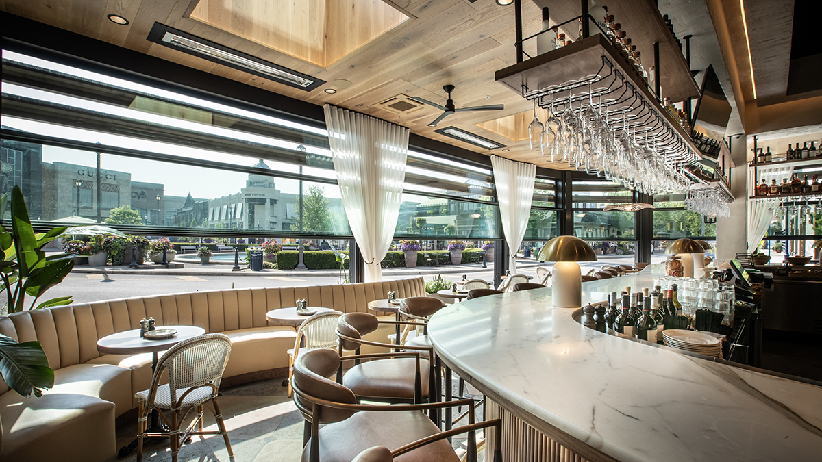 Featured image for “Bar Italia Elevated by Retractable Glass Wall System”